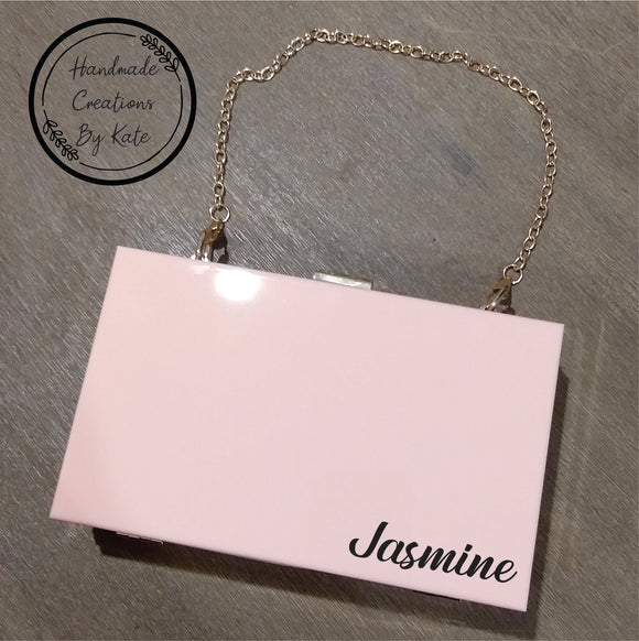 Pink clutch bag
